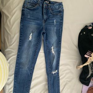 skinny blue jeans mild distressing